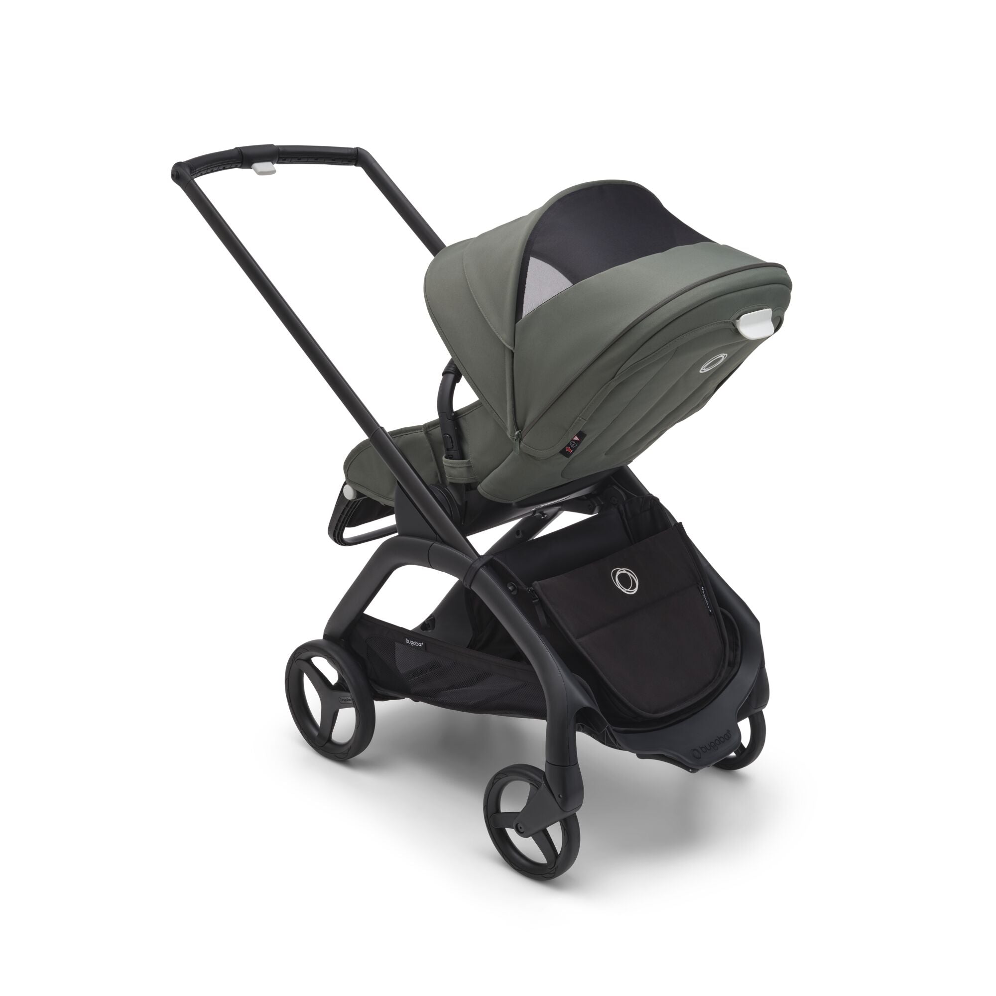 Coche Dragonfly de Bugaboo con silla mirando a los papas y capota con ventanilla para mirar a tu bebe en Blanca y Augusto