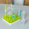 Set mamaderas y accesorios un set de partida genial y practico de boon con 4 mamaderas y cepillos de limpieza de mamaderas. foto ambientada
