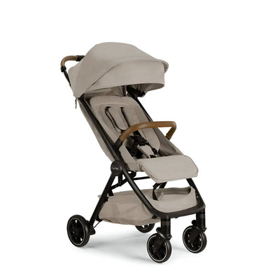 Coche NuaTRVL Beige. Un coche compacto de excelente calidad para la ciudad y viajes Incluye bolso