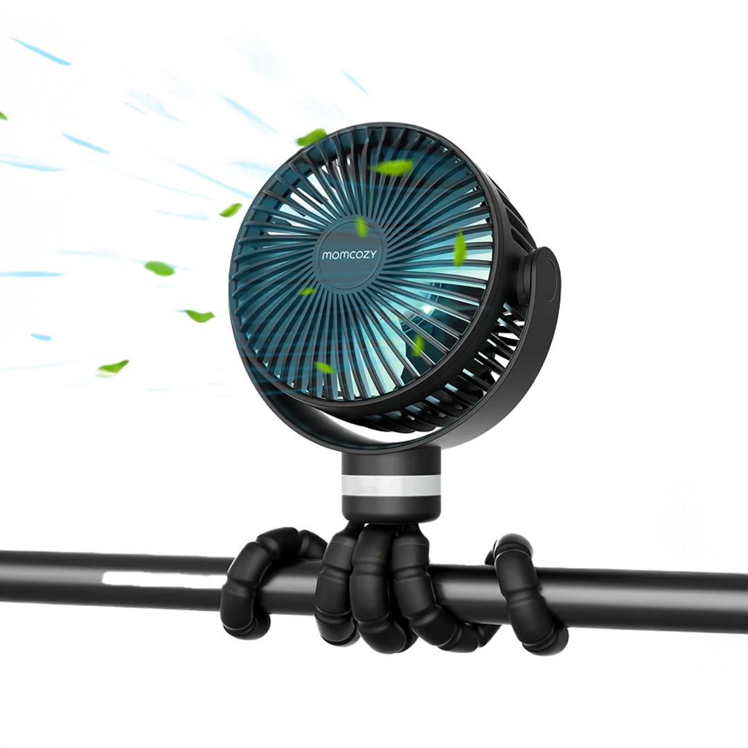 Ventilador portátil Momcozy colocado en un cochecito, manteniendo fresco al bebé durante un paseo