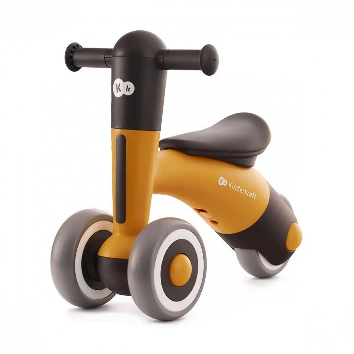 Triciclo de balance Kinderkraft MINIBI en color amarillo, diseño compacto y ligero ideal para los más pequeños.